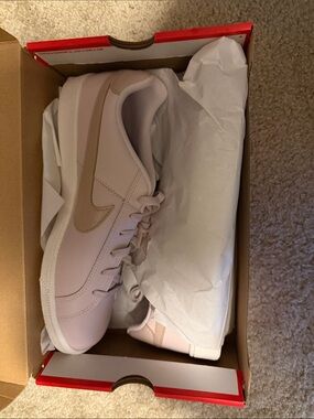 Nike Women's Low-Profile Leather Sneakers in Pale Pink with Beige Swoosh